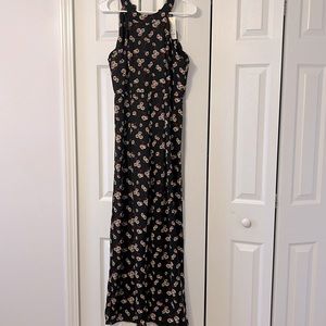 NWT black jumpsuit with white and red daisies
